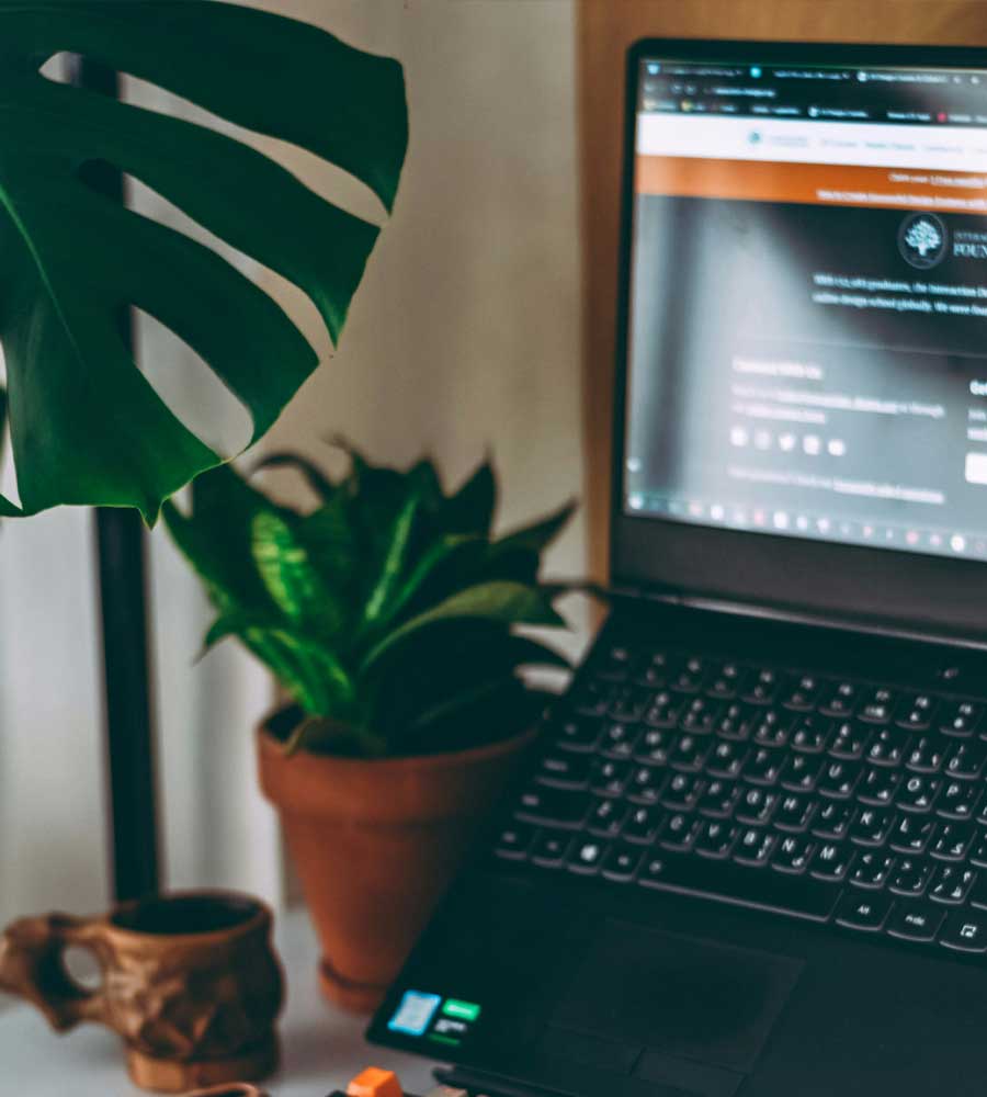 Laptop showing website maintenance being performed